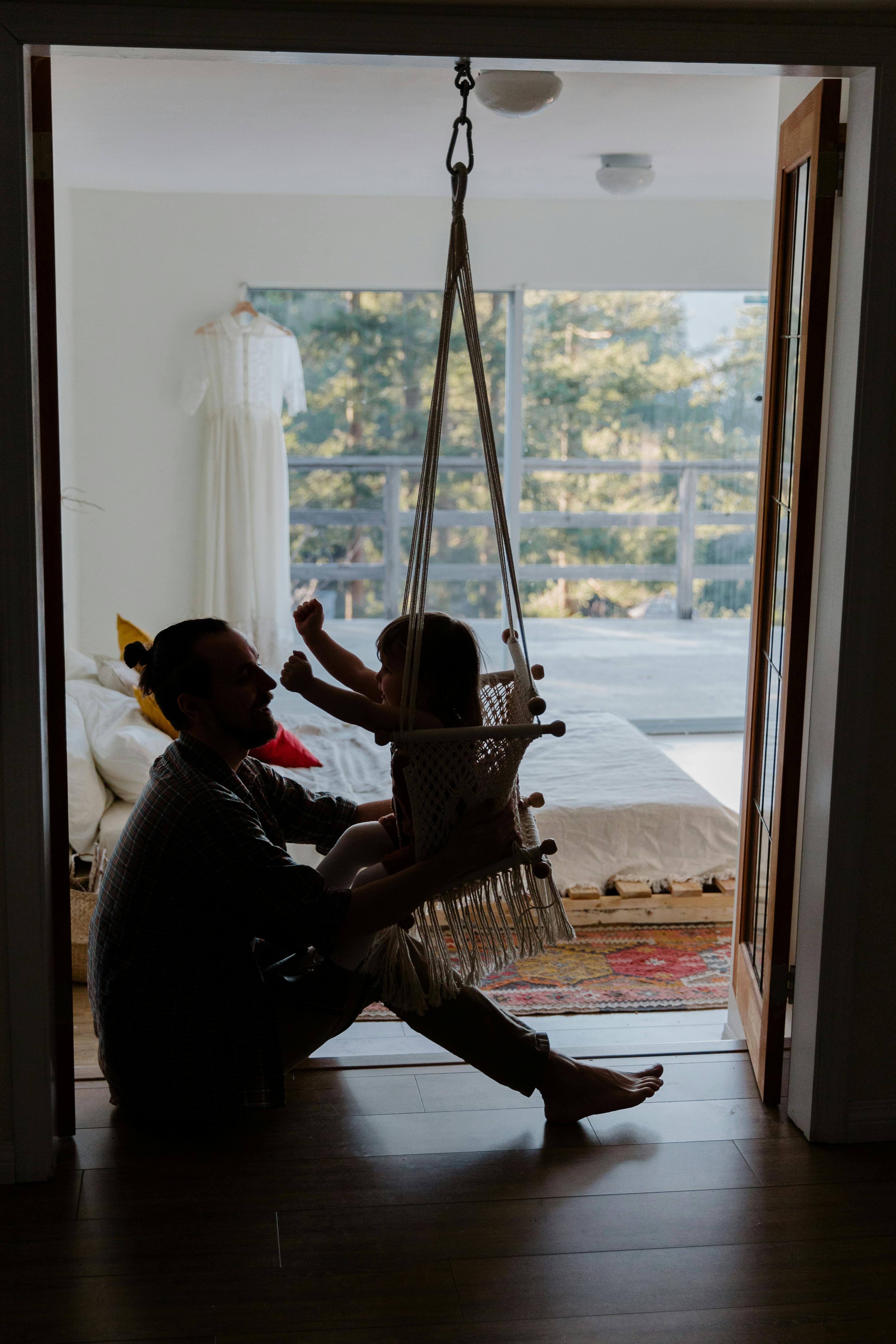 A father playing with his daughter | Source: Pexels