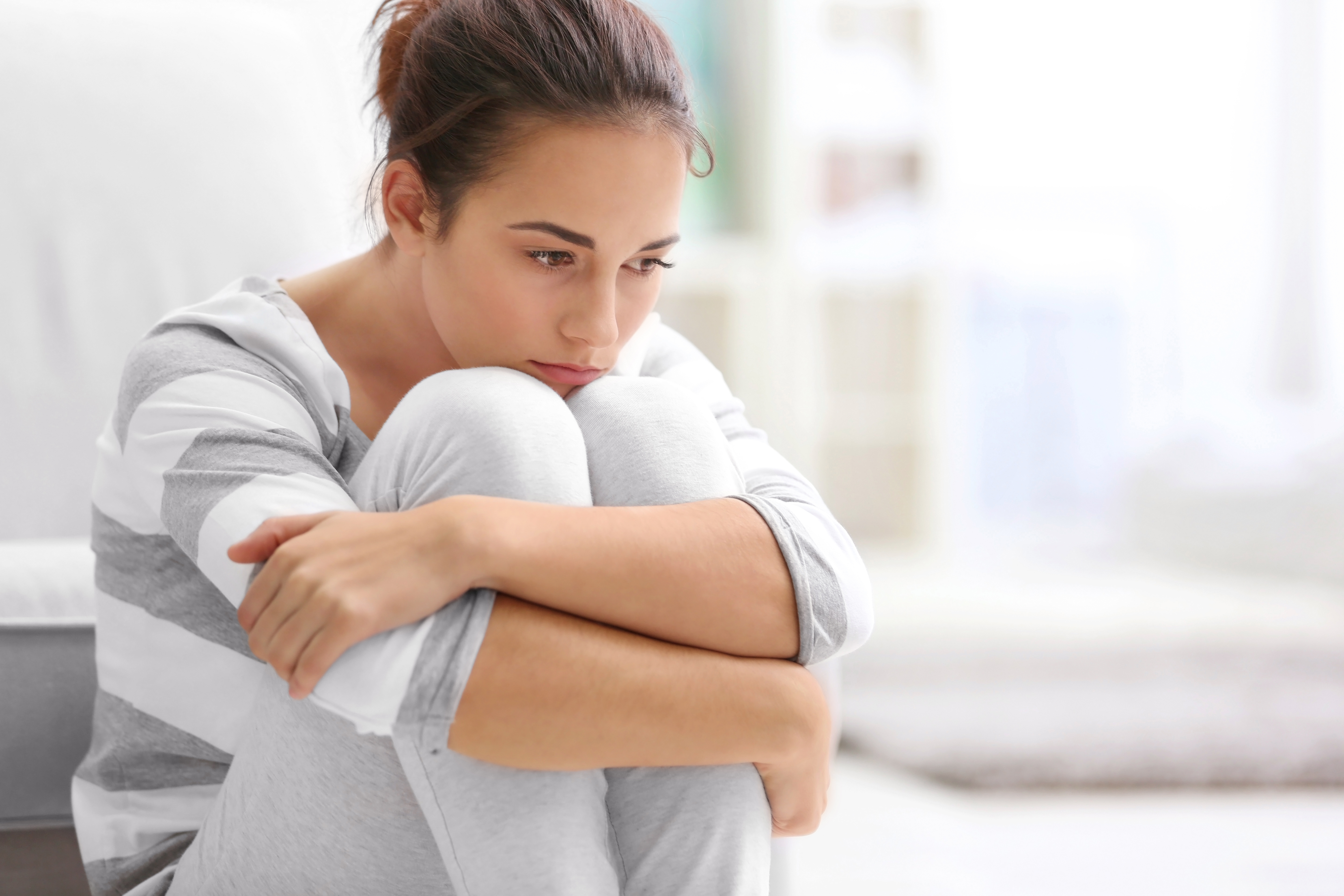 Young girl in deep thought | Source: Shutterstock