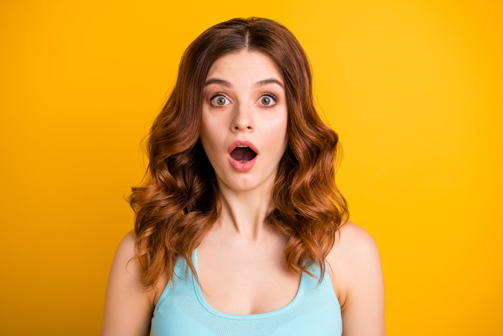 A woman looking shocked | Source: Shutterstock