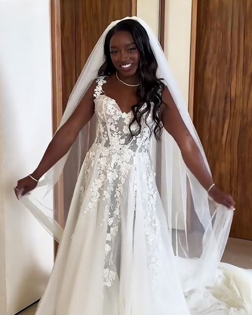 Simone Biles Faces Criticism Over Hair in $120 Wedding Dress – Olympic Star Who Faced Childhood Struggles Fires Back